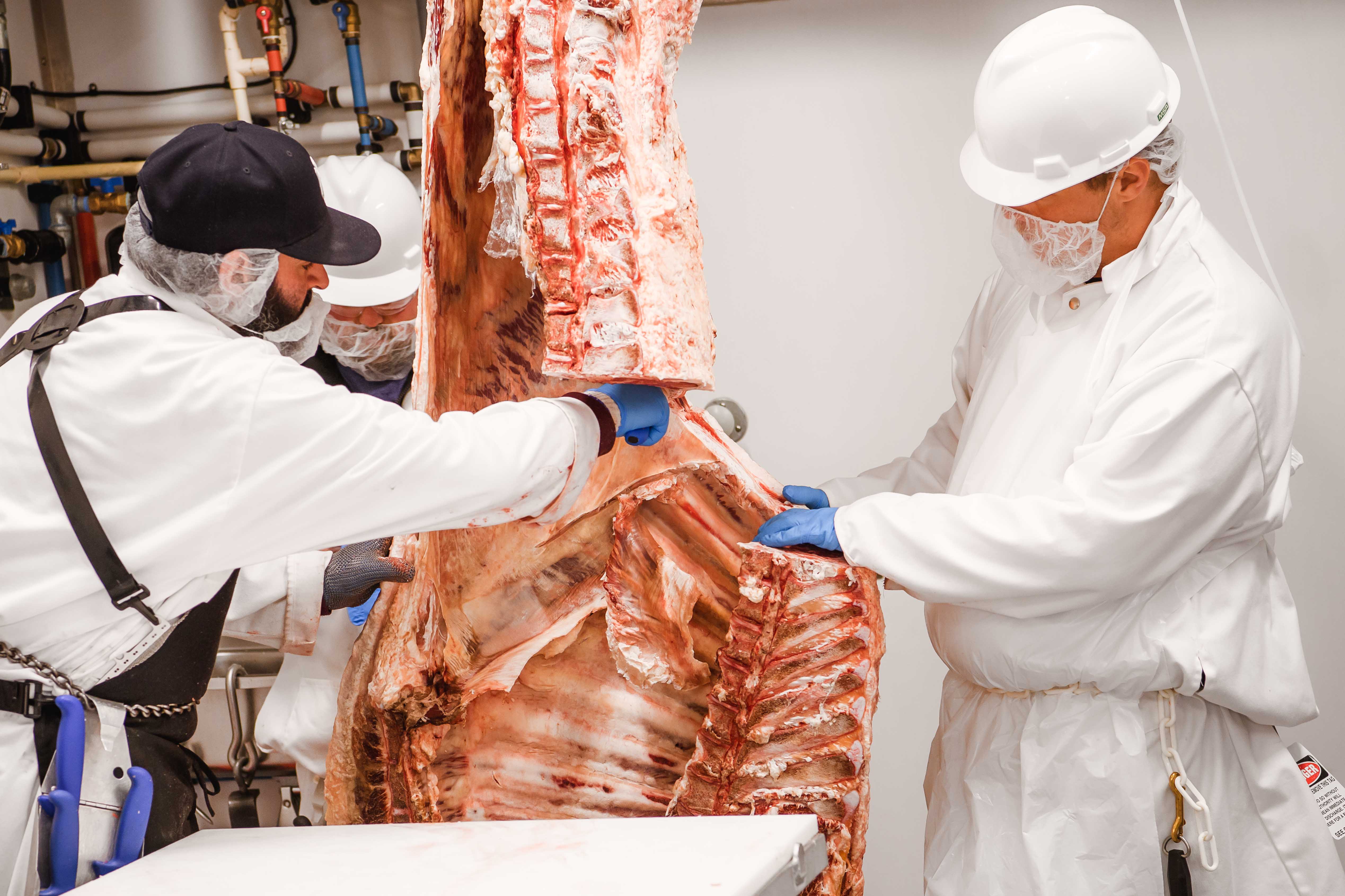 Butchers breaking a side